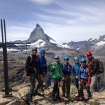 The team poses on top of the Rifflehorn with the Matterhorn in the background. (Liz Smart)