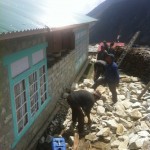 Rebuilding damaged wall in Phortse (Phunuru Sherpa)