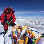 IMG Guide Josh McDowell on the summit of Everest