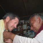 IMG Partner Phil Ershler being blessed by Lama Geshe. (Greg Vernovage)