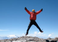 IMG climber celebrates on the summit of Aconcagua (Ben Kurdt)