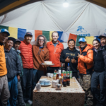 Entire Manaslu team celebrate after summit