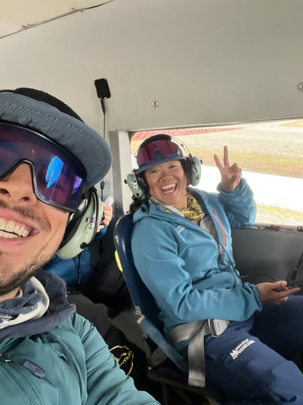 Lead Guide, Alex Bond, and Assistant Guide, Lindsey Valero, sitting in the ski plane abut to take off