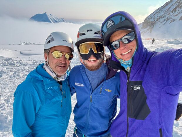 Garret Madison, Jackson Hallza, and client at 14' Camp