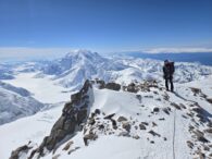A climber stands on the West Buttress of Denali/McKinley
