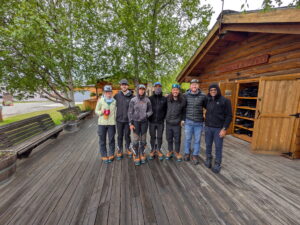 An IMG Denali team takes a group photo in Talkeetna