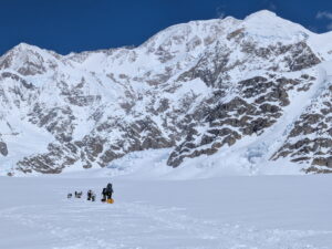 A team walks up the Kahiltna Glacier
