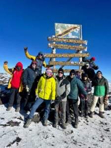 September Kili climbers at Uhuru Peak (Max Bond)