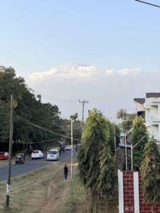 The summit of Kilimanjaro rises above Moshi (Max Bond)
