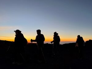 Traversing the crater rim from Stella Point to Uhuru Peak (Phunuru Sherpa)