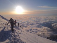 An IMG rope team on one of the final pushes to the summit of Mt. Rainer. (Photo by IMG Guide Chris Meder)