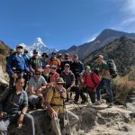 Team Photo with Ama Dablam behind. Ang Pasang is at the lower left of the photo. (Harry Hamlin)