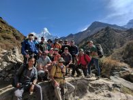 Team Photo with Ama Dablam behind. Ang Pasang is at the lower left of the photo. (Harry Hamlin)