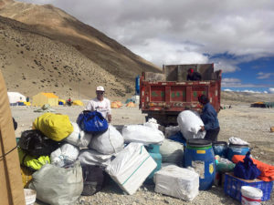 PK Sherpa unloading gear at Gyaplung (Phunuru Sherpa)