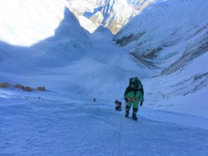 IMG Climber on the Lhotse Face with Camp 2 below (Kevin Kayl)