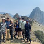 At the Machu Picchu citadel with the rocky peak of Waynapicchu rising behind (Tyler Nachand)