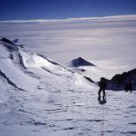 Topping the headwall with Sue's Pyramid in the background (IMG)